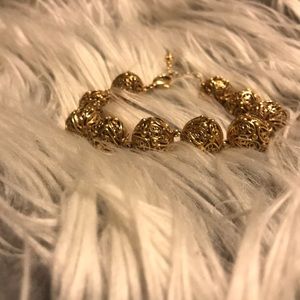 Gold hollow ball bracelet